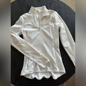 Fitted and formed white athletic jacket